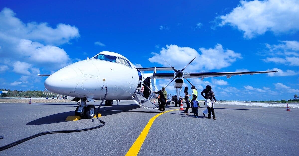 airplane on the tarmac at a small airport